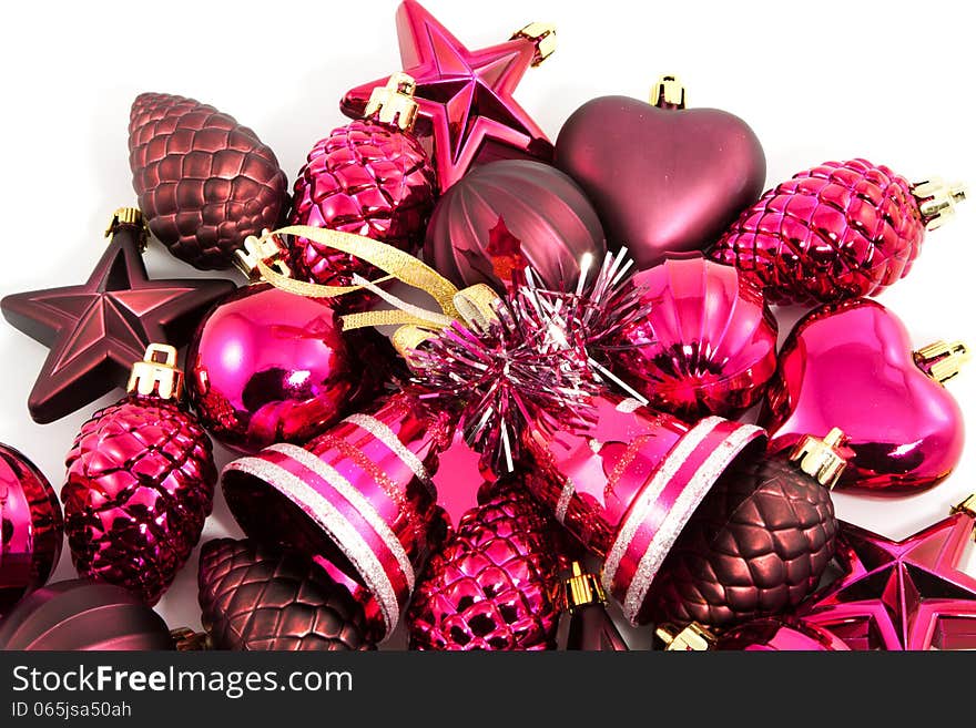 Purple xmas toys on a white background