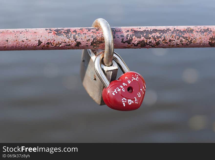 Padlock red heart-shaped. Love concept