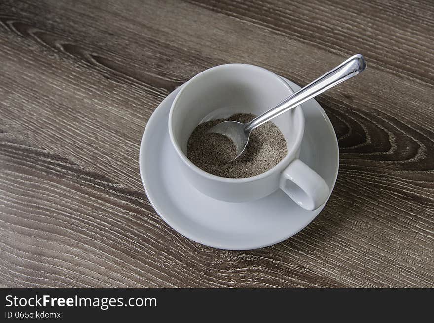 Cup Of Coffee On The Wooden Floor.