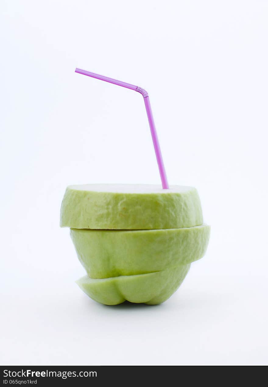 Guava fruit with straw on clean white background