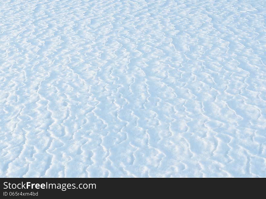 Surface of snowy field after a blizzard. Surface of snowy field after a blizzard