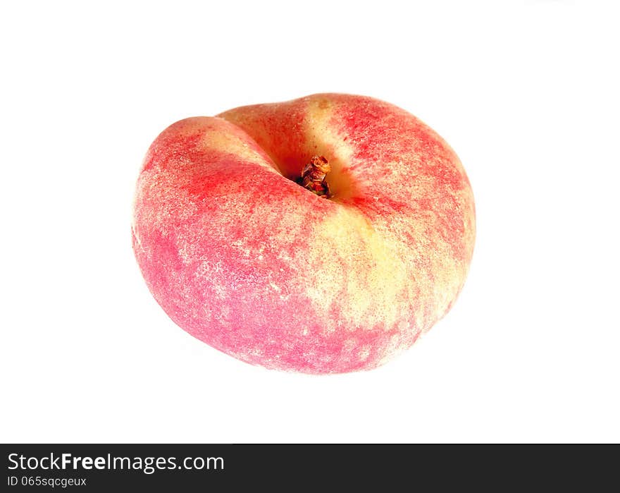 Fruit of the flat peach isolated