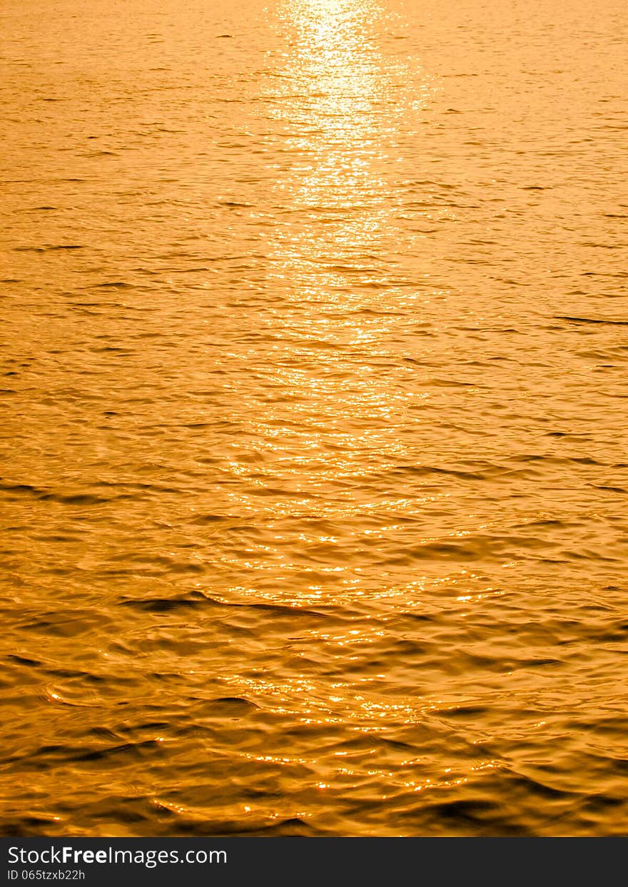 Reflective sun on water abstract background