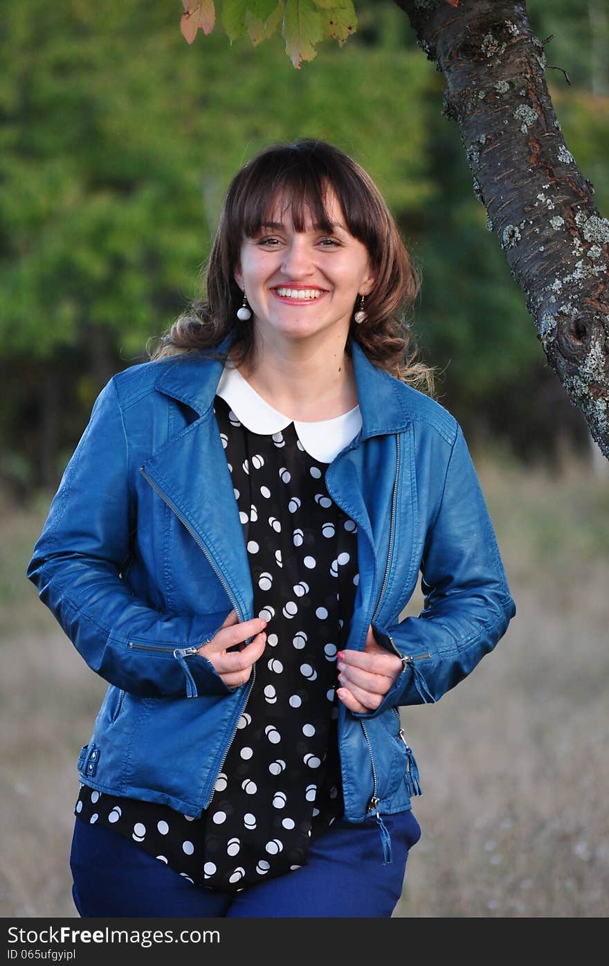 Smiling woman in woodland portrait