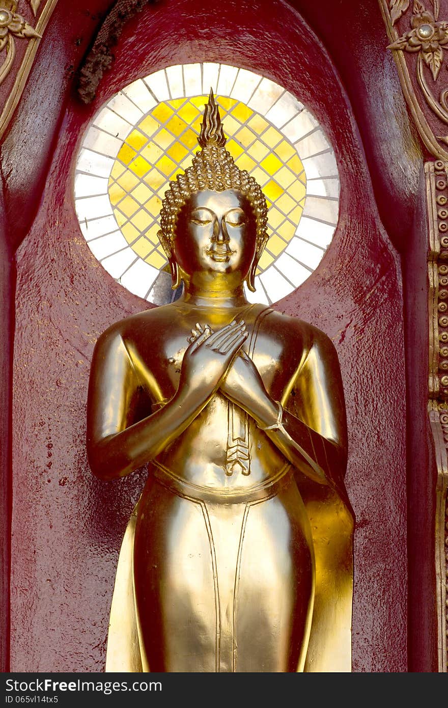 Gold buddha statue mirror background reflection sun light