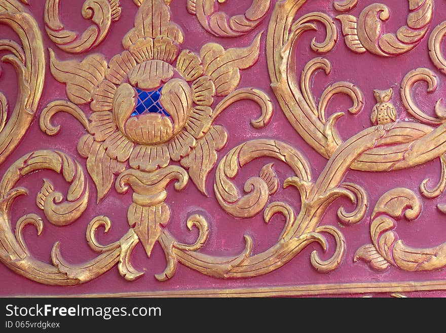 Stucco gold red wall burgundy color thai art. Stucco gold red wall burgundy color thai art