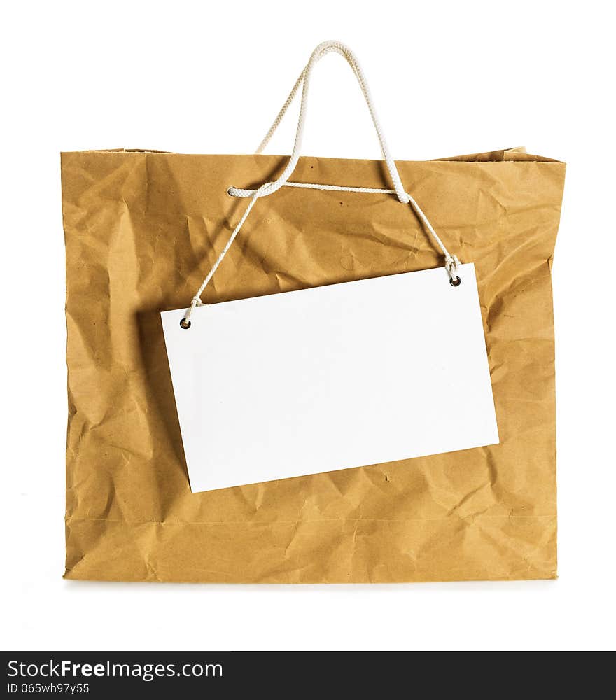 Blank note paper with wrinkled paper brown bag.Isolate on white. Blank note paper with wrinkled paper brown bag.Isolate on white.