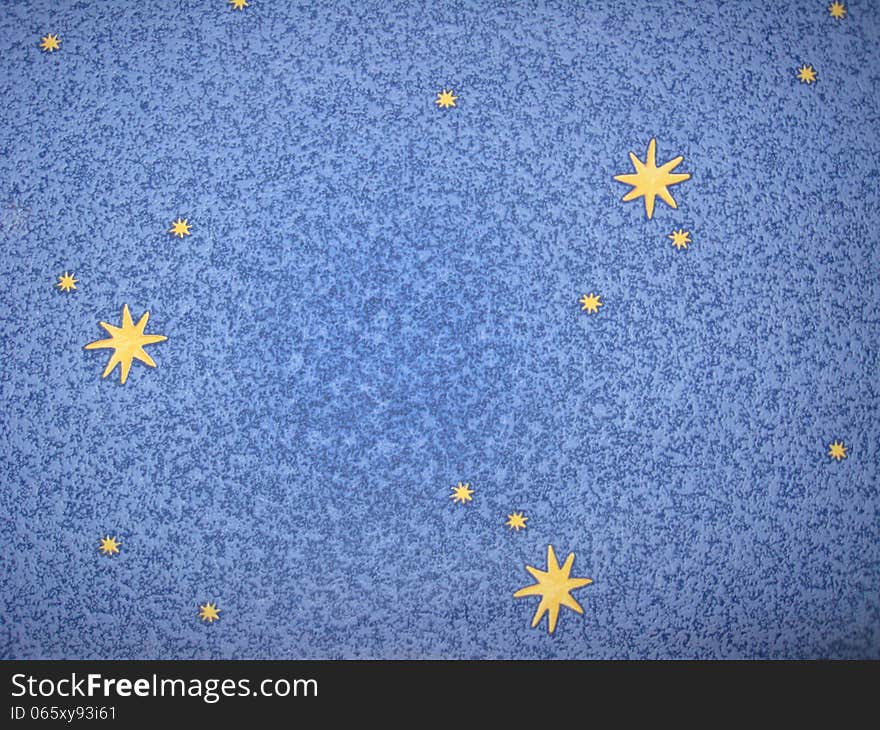 The image of the blue background with yellow stars