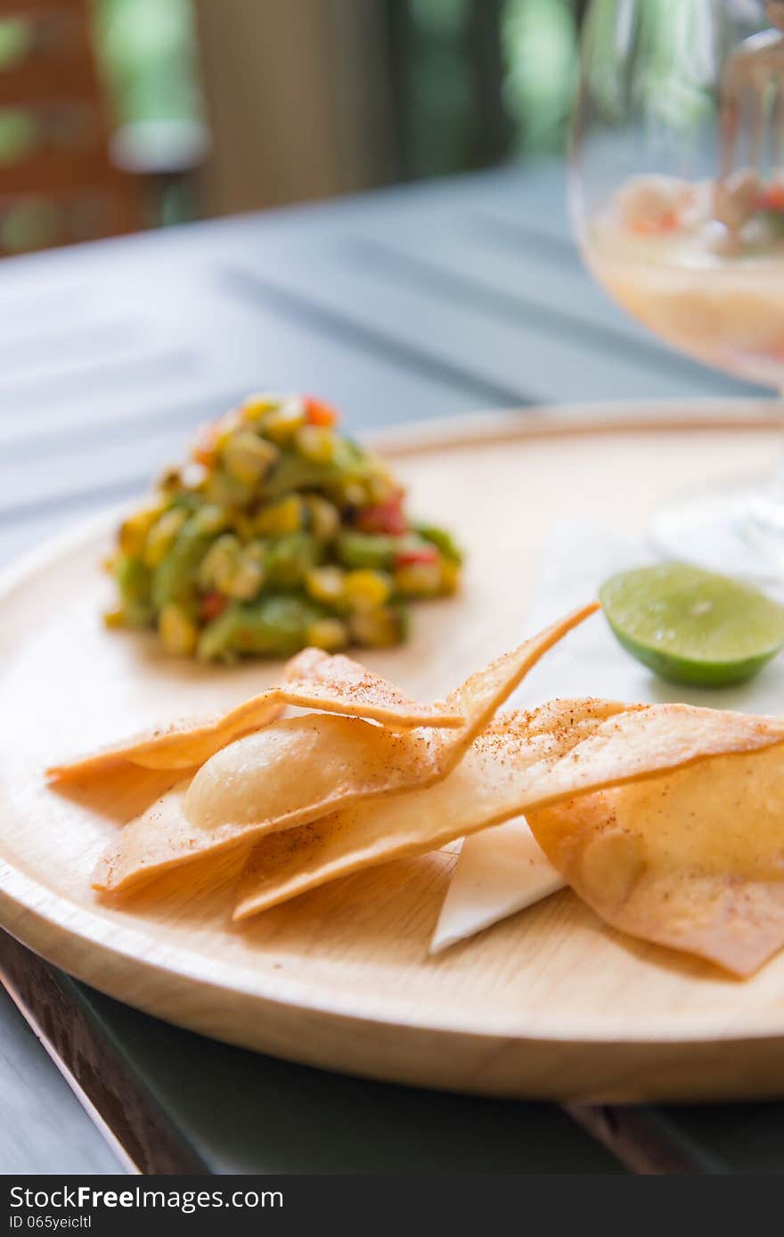 Nachos chips salsa salad