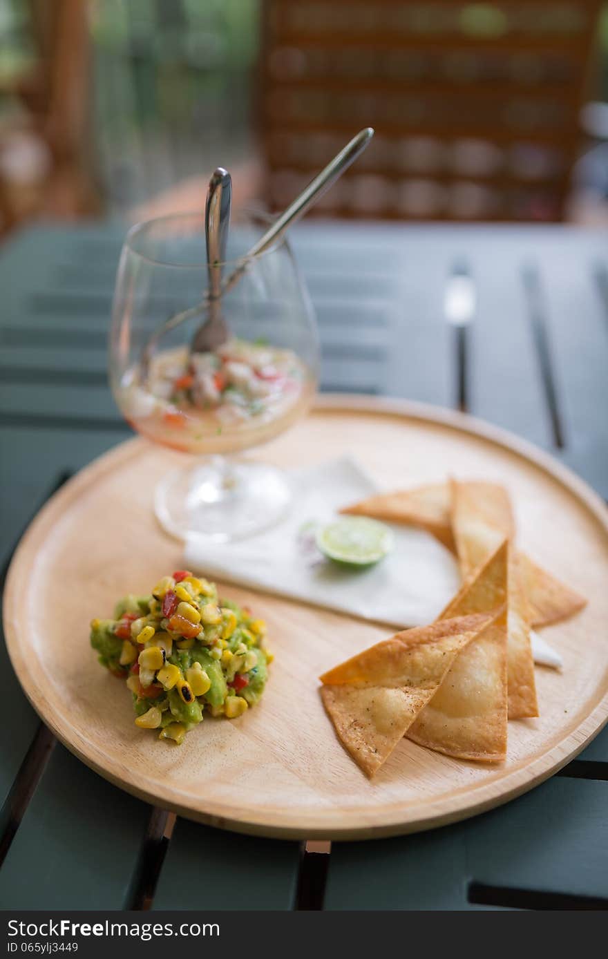 Nachos chips salsa salad