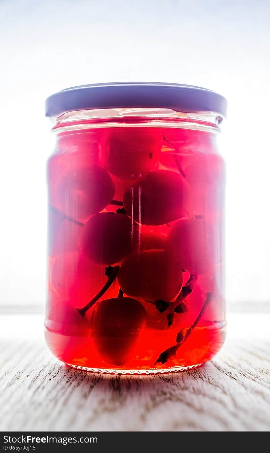 Canned maraschino cherries close up. Canned maraschino cherries close up