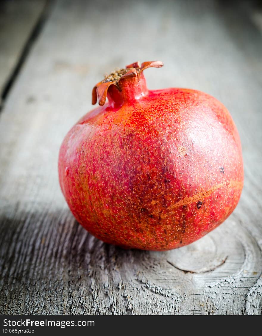 Close up of two ripe pomegranates