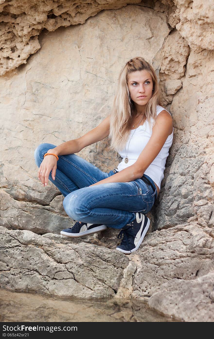 Beautiful young woman in rocks. Beautiful young woman in rocks