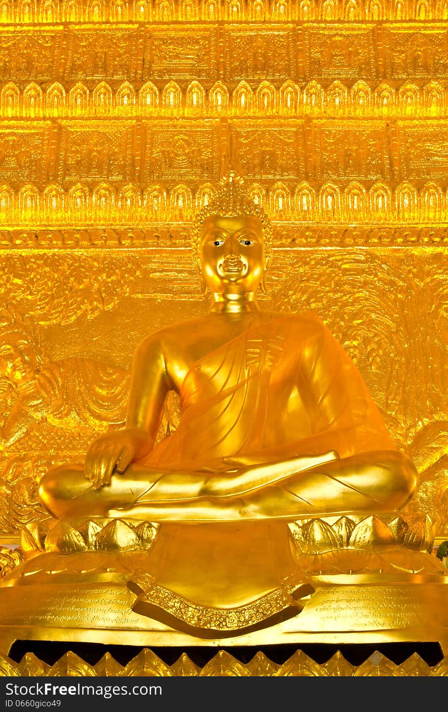 Golden buddha statue at the temple in Thailand.