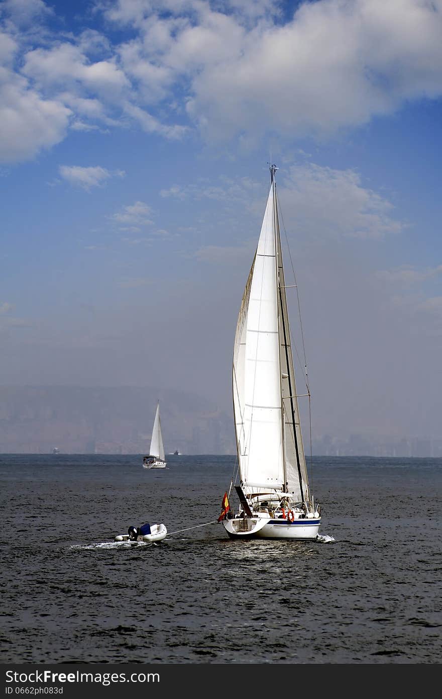 Sloop sailing in open waters. Sloop sailing in open waters