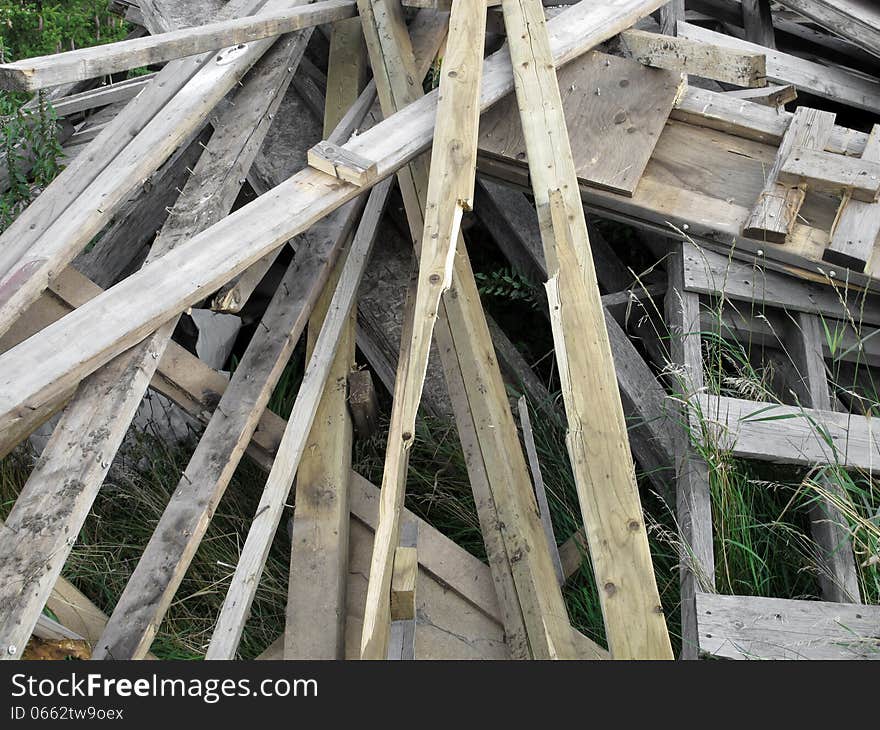 Pile of old discarded boards.