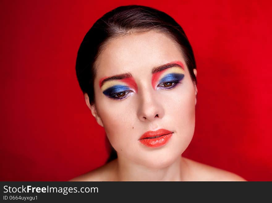 Beauty portrait of a girl with colorful make up