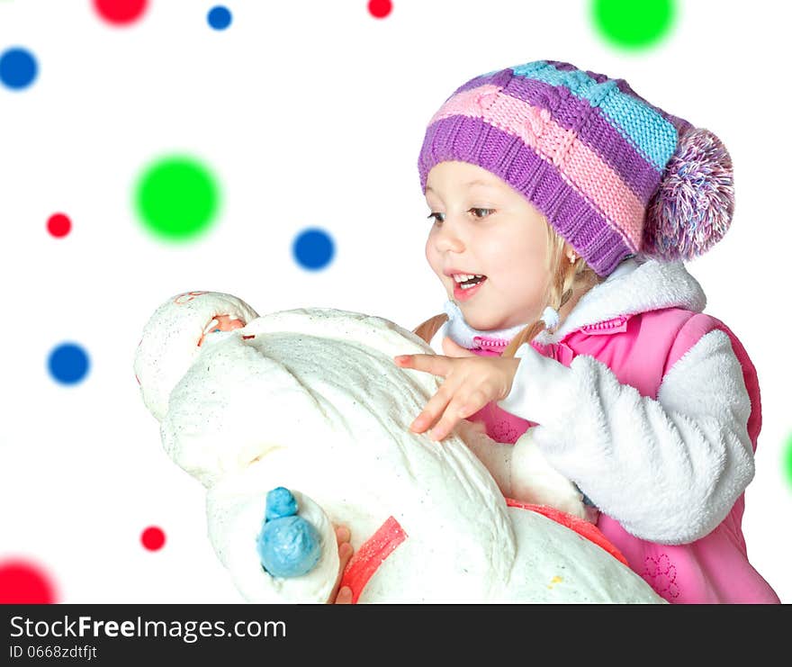 Portrait of a little girl holding santa claus, christmas, new year, winter