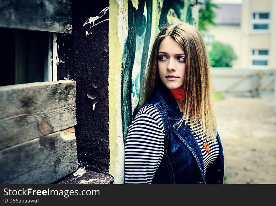 Curious woman looking in uncertainty of darkness