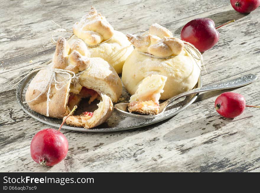 Paradise apples baked in pastry, in shape of bags