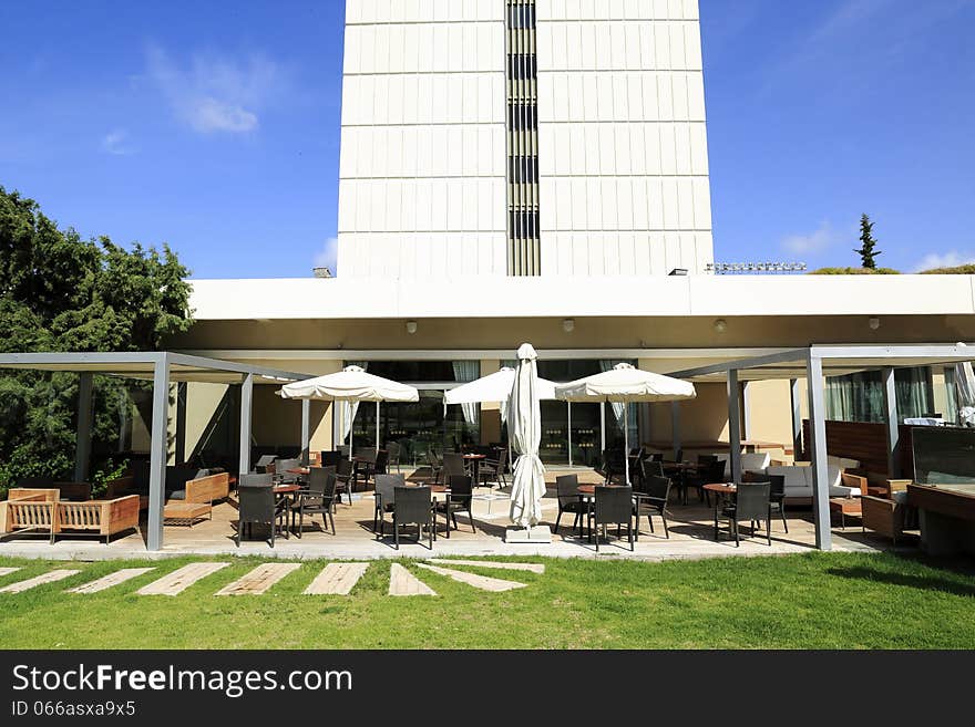 Hotel guests in the cafe patio. Hotel guests in the cafe patio