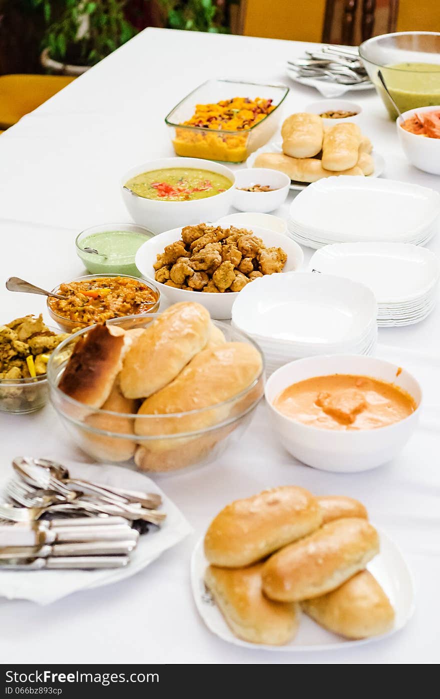 Table full of different indian dishes. Table full of different indian dishes