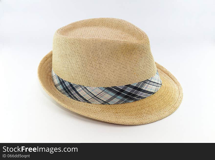 Sraw hat with blue ribbon isolated on white background