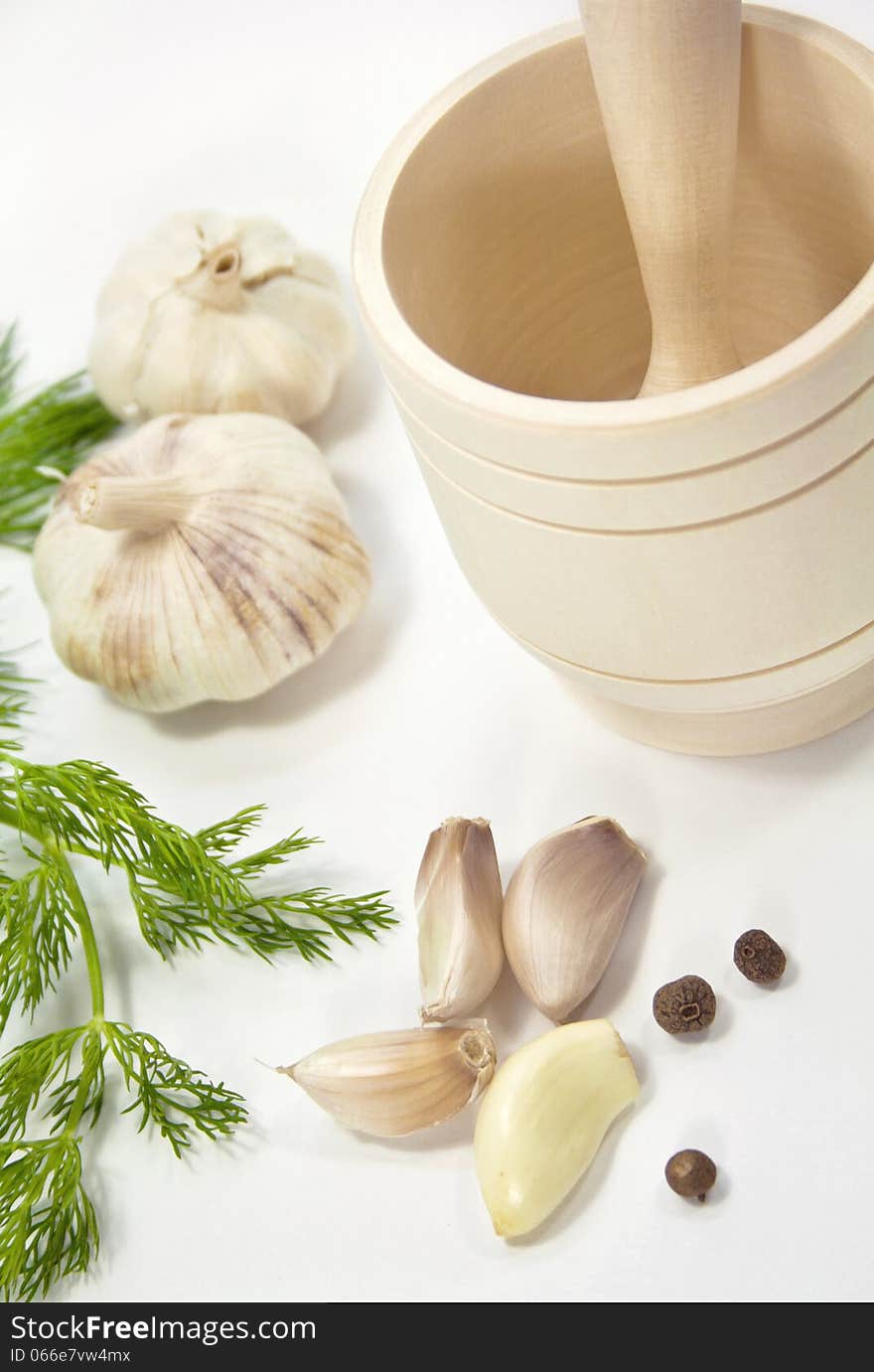 Garlic and pepper on a white background