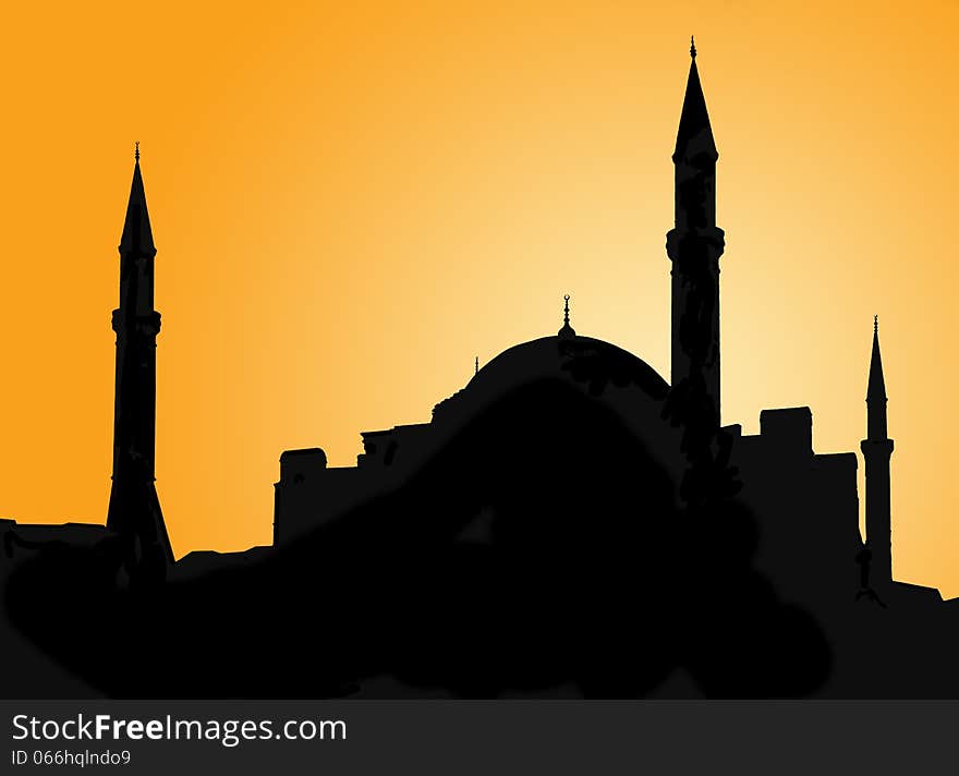 Silhouette of a mosque against evening sky