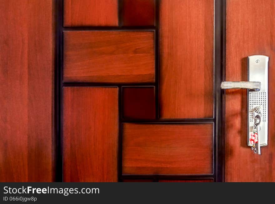 Abstract unique wooden pattern door with handle lock