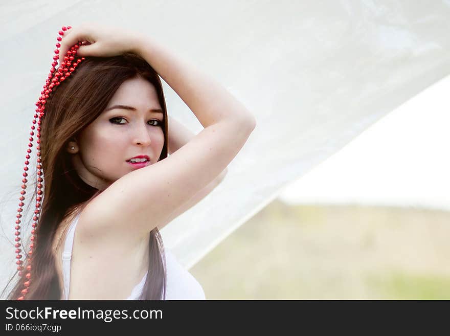 Girl s face with flag ang red beading