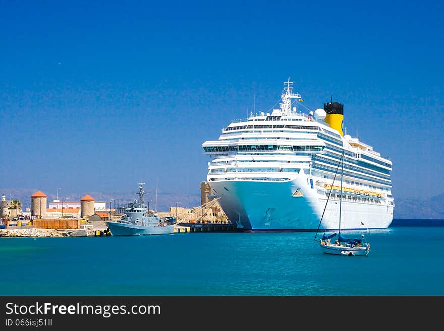 White cruise liner in the port of Rhodes Greece. White cruise liner in the port of Rhodes Greece