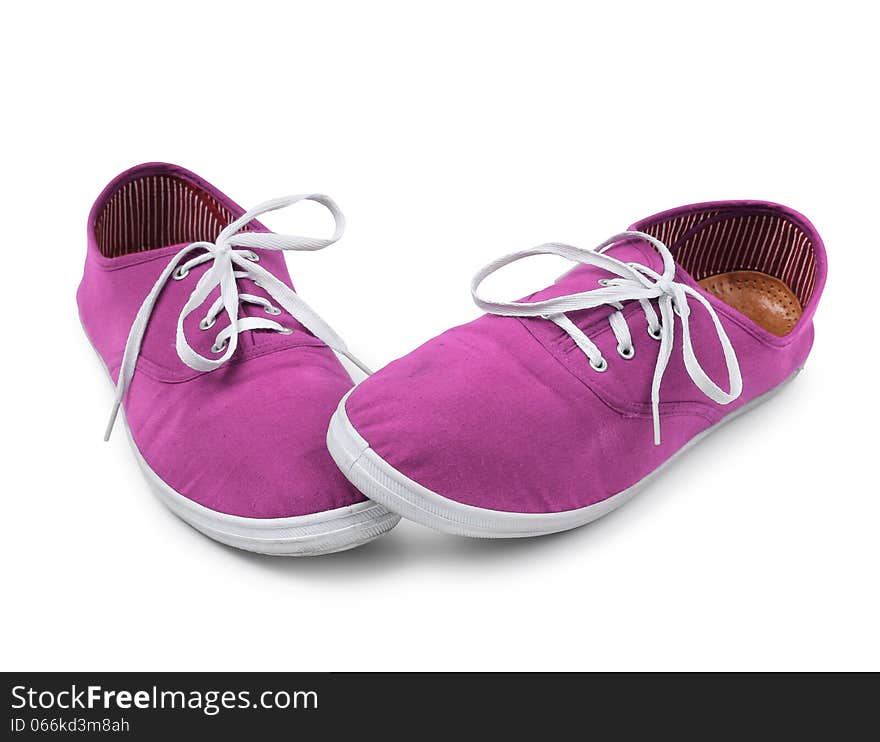 Shy pink sneakers isolated on white, shyness concept