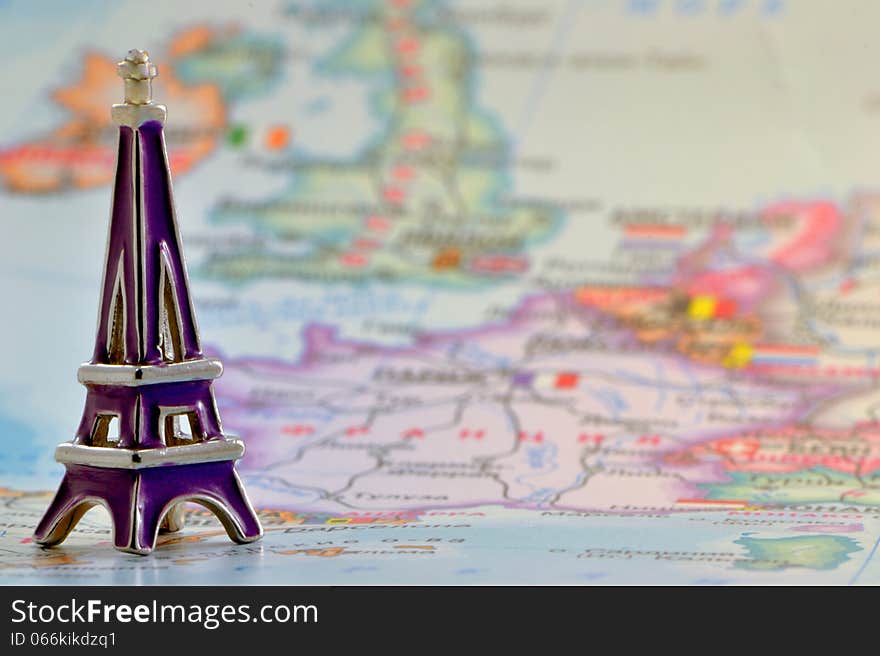 Model of the Eiffel Tower on a background map France