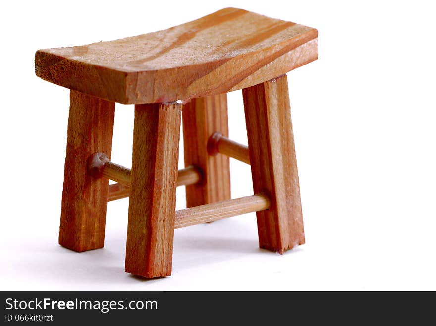 Wooden stool isolated on a white background