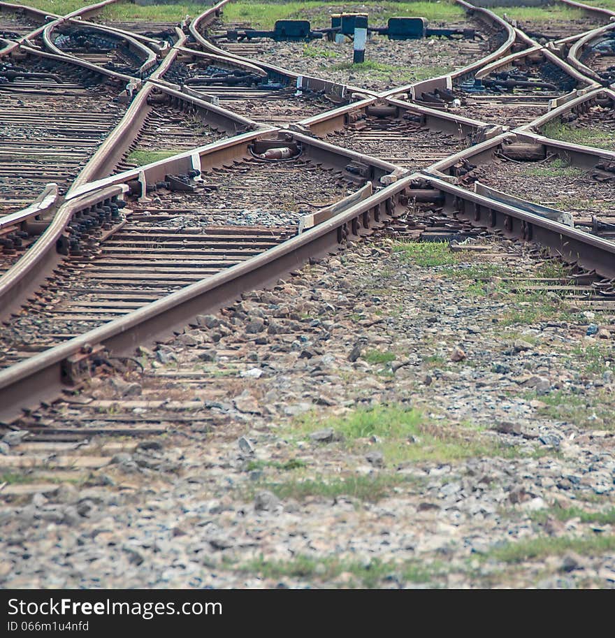 Railway texture background. Railroad - transport landscape with lines of rails. Perspective way on forward railway.