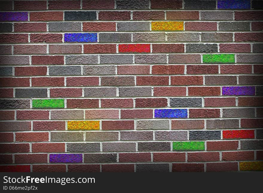 A colorful dark brick wall. A colorful dark brick wall.