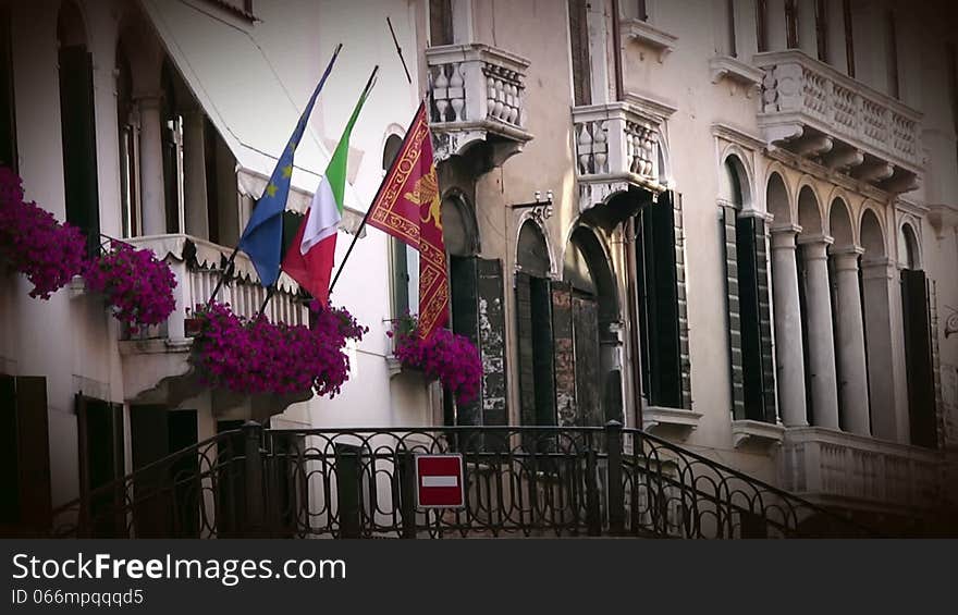 Venice. Building and flags