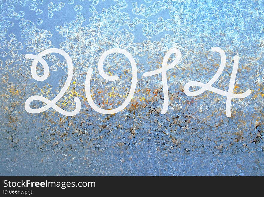 2014 on the frozen surface of the window. 2014 on the frozen surface of the window