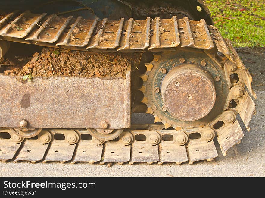 Excavator tracks, Backhoe wheel located on site for constuction