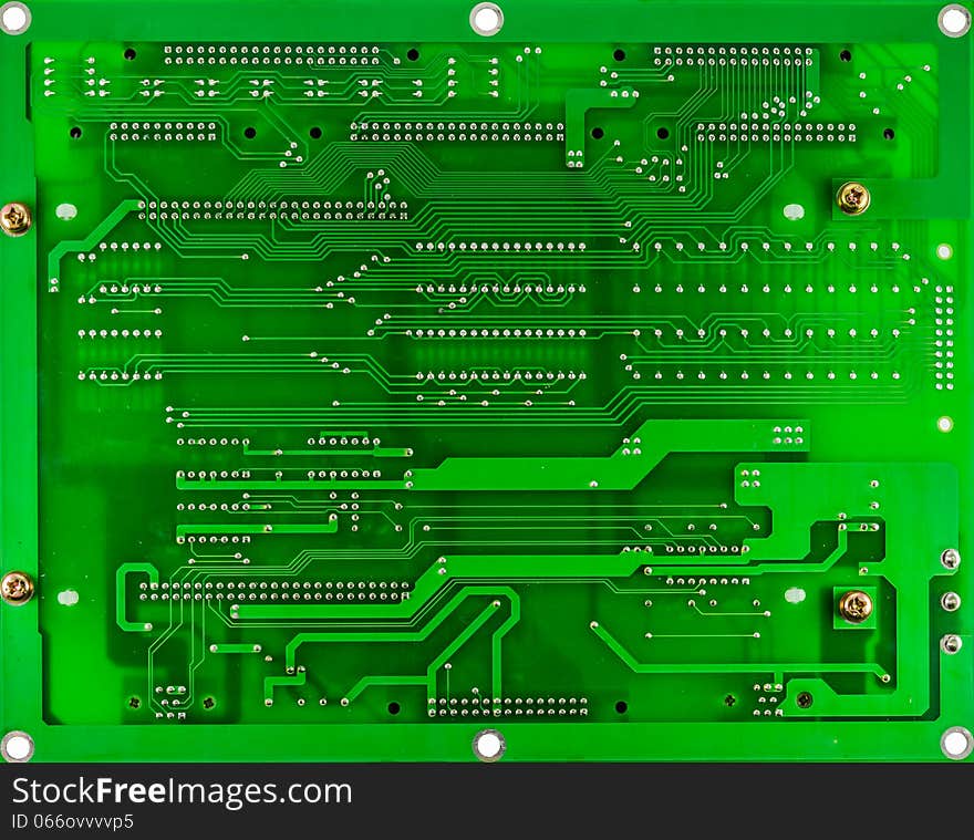 Close up of a printed green computer circuit board