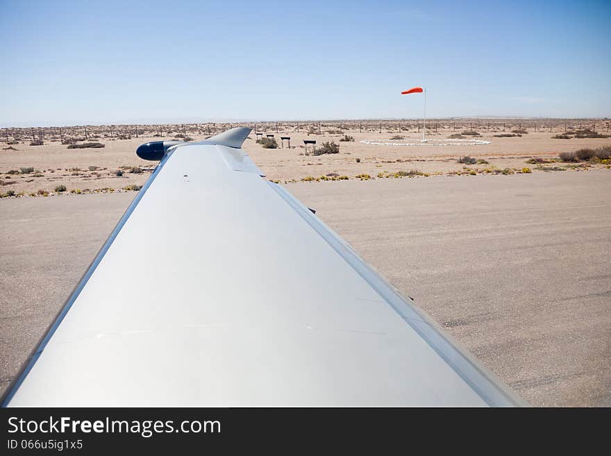 Desert view from aircraft on runway