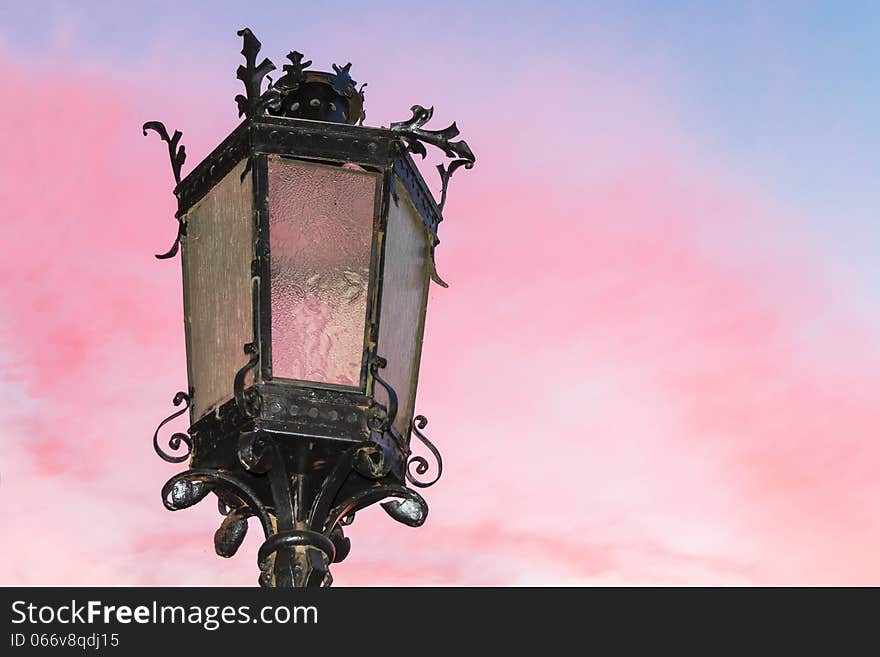 Old stylish lamp. Street of Warsaw capital of Poland.