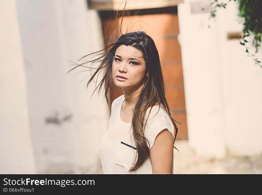 Portrait of beautiful japanese woman in urban background