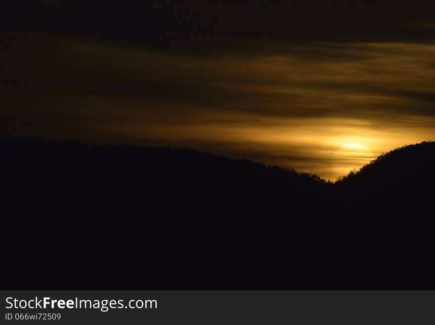 Spectacular sunset with hidden sun. Spectacular sunset with hidden sun