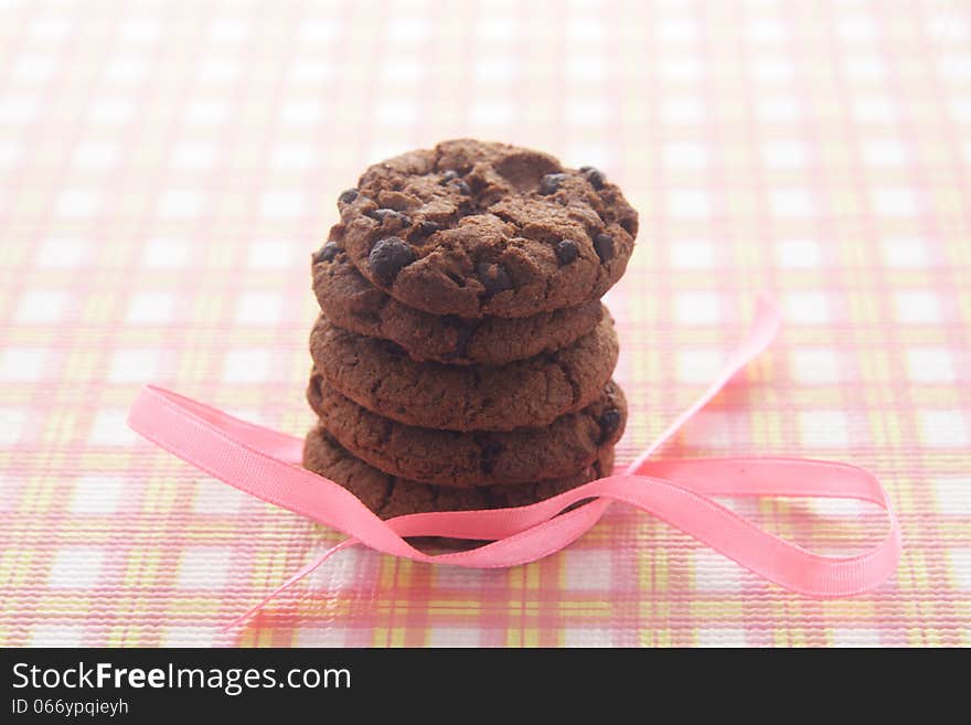 Chocolate Cookies at pink plastic. Chocolate Cookies at pink plastic