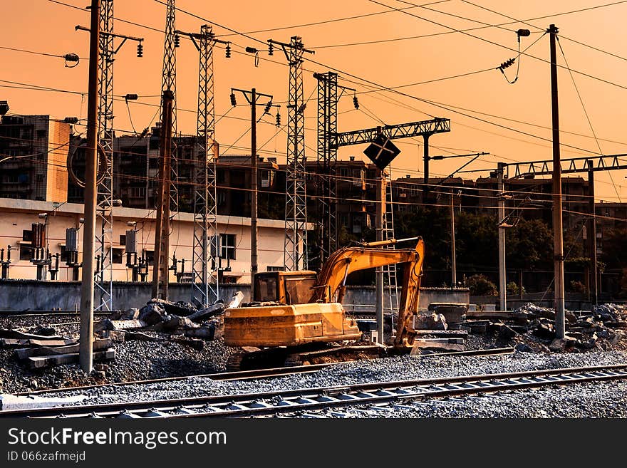 Railway construction site in sunset