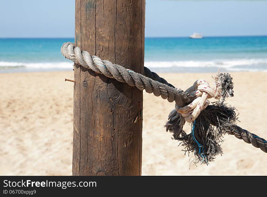 Nautical rope tied to a pole