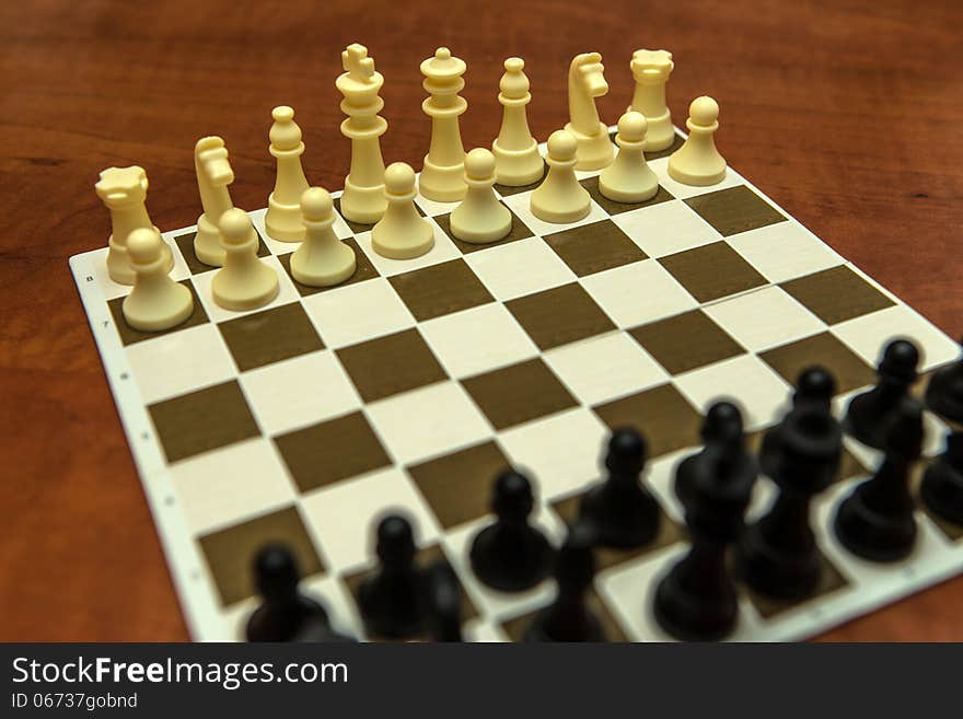 Bunch of chess on the bed sheet