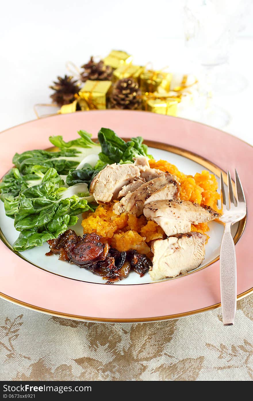 Herb chicken served with mashed squash, Chinese cabbage and caramelized onions, a healthy alternative for Christmas, Thanksgiving or Hanukkah. Herb chicken served with mashed squash, Chinese cabbage and caramelized onions, a healthy alternative for Christmas, Thanksgiving or Hanukkah